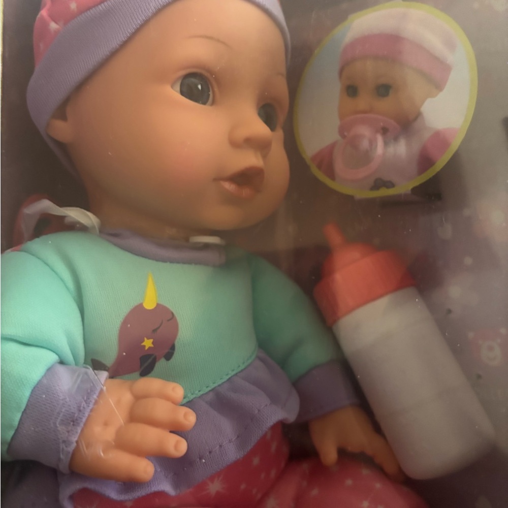 Adorable Baby Doll with Unicorn Outfit